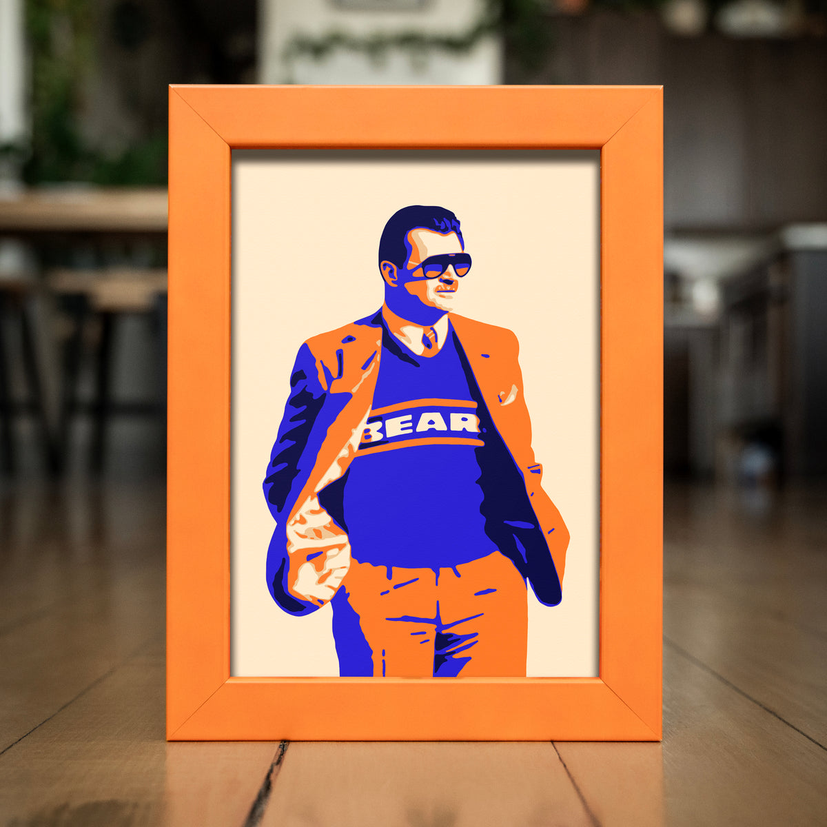 DA COACH | Marco de color naranja a juego