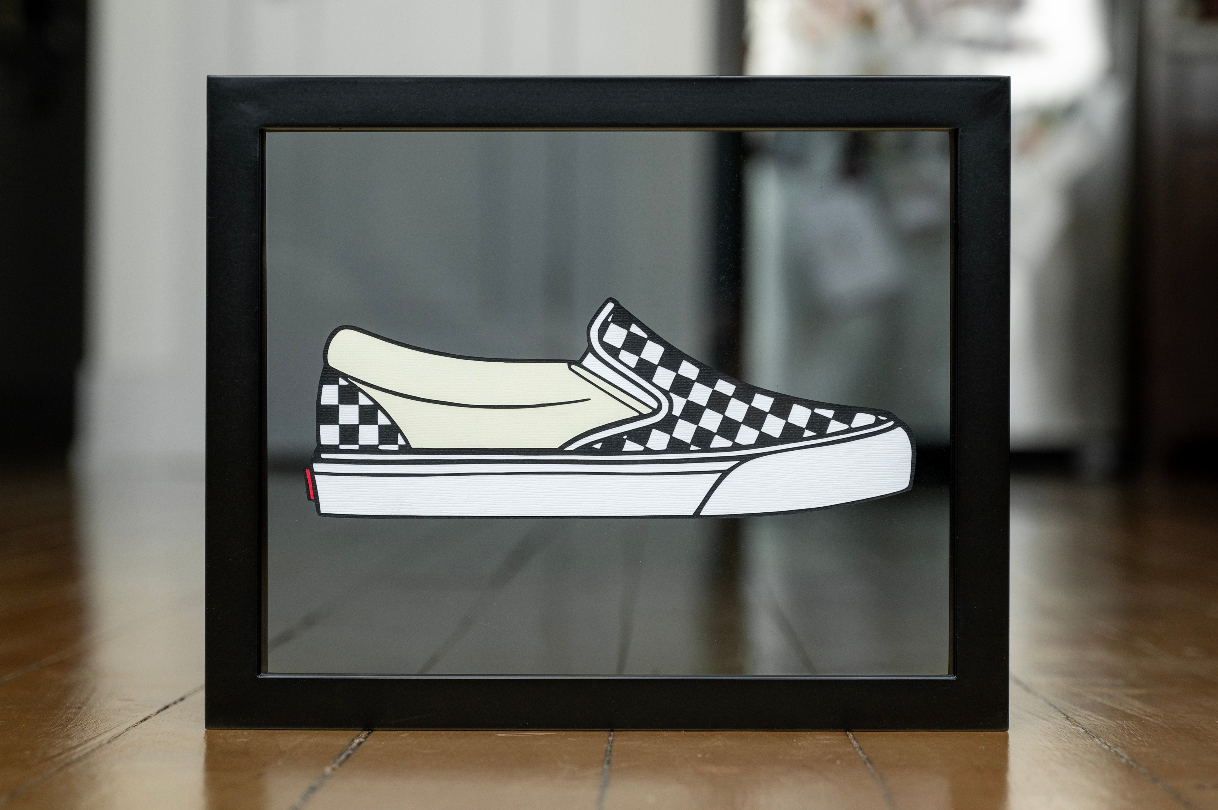 Drawing of checkered retailers vans